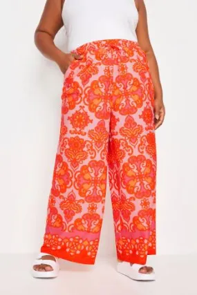 LIMITED COLLECTION Curve Orange Abstract Print Wide Leg Trousers